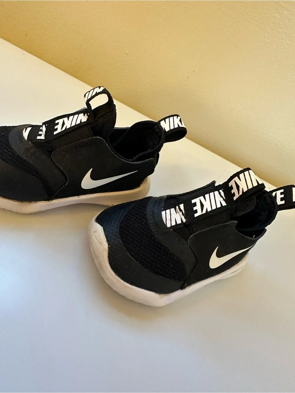 Nike Kids Black & White Slip-On Athletic Sneakers